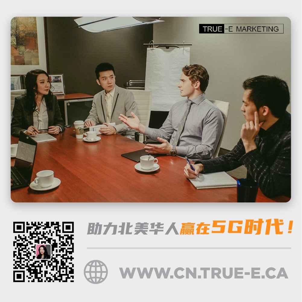 A group of people sitting at a table

Description automatically generated